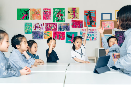 Students learning with digital tablets