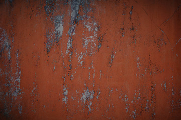 old red wall showered paint. red background texture.
