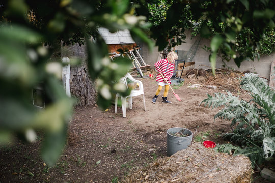 view of intel girl working in her yard