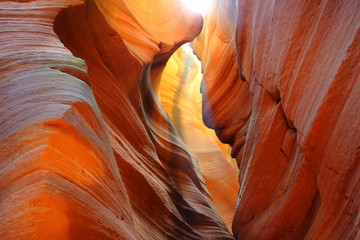 Magical colours and textures inside red rocks of Slot Canyon
