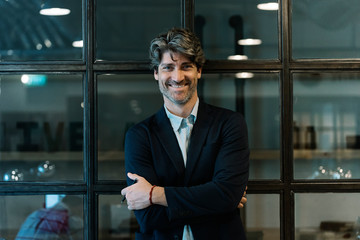 Portrait of handsome businessman in the office.