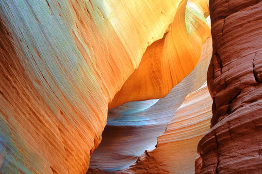 Magical colours and textures inside red rocks of Slot Canyon