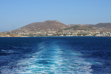 Swirl on the sea caused by the ferry leaving the island of Paros