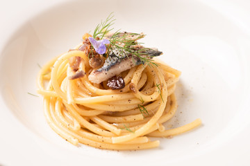 Italian pasta with sardienes, close up