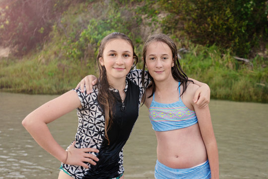teen sisters at the beach Stock Photo | Adobe Stock