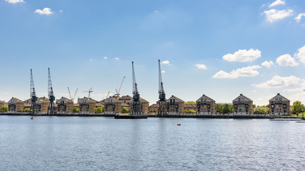 Fototapeta na wymiar Panoramic view of houses at Royal Victoria Dock in London