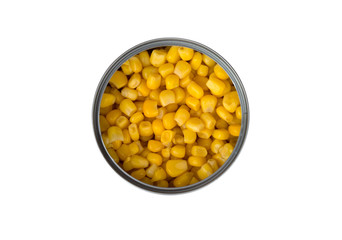 Canned corn on a white background. Corn closeup in an iron jar on a white background.
