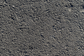 textured asphalt texture with gray holes