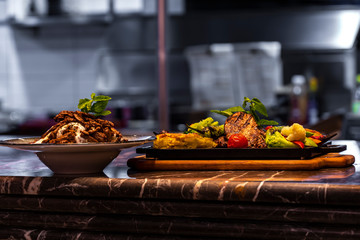 Beef Steak Served on a Sizzling Iron and Wood Plate