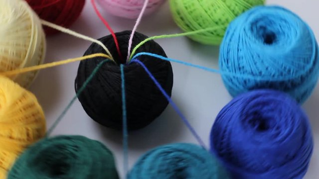 Colorful yarn for knitting on White background