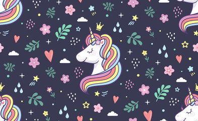 Seamless vector pattern. Unicorn with rainbow mane and doodle style elements for textile, print or web design.