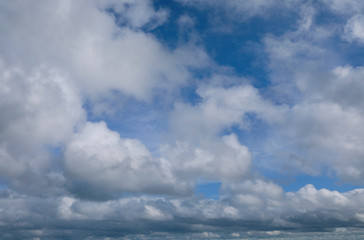 Naklejka na ściany i meble blue sky with white clouds to horizon