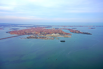 Aerial view of Venice and the Venetian laguna with a cruise ship in the foreground © eqroy