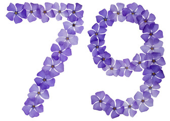 Numeral 79, seventy nine, from natural blue flowers of periwinkle, isolated on white background