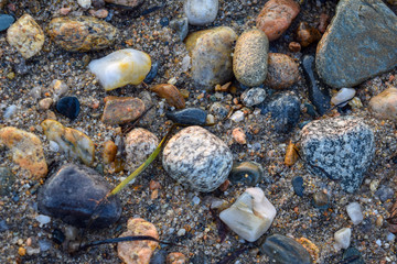 Mid-sized rocks, stones, and pebbles in various colors and shapes