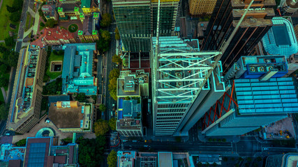 Fototapeta premium Top down aerial view of skyscrapers in a downtown city district
