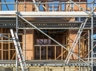 Scaffolding in a snakes and ladders configuration on a building site