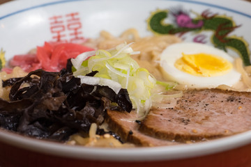 Ramen tonkotsu with pork, soy milk, pork broth,.black mushrooms, eggs, onions
