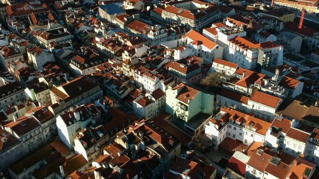 Aerial revealing shot of the city of Lisbon with the Tejo river in the background, Protugal