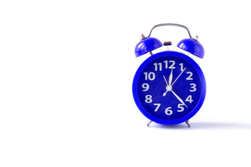 Alarm clock of blue color. Isolated on a white background. Front view