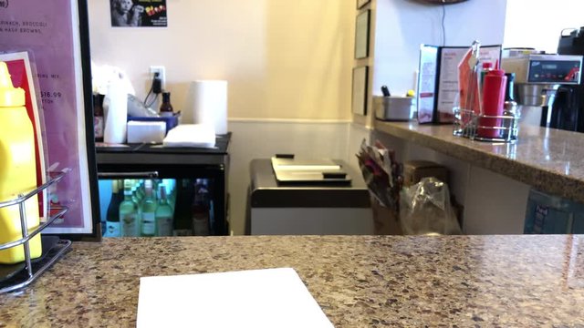 ice cold beer during happy hour after work in Hawaii sitting at the bar