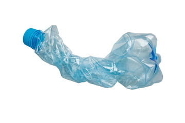 Squashed empty used plastic PVC bottle isolated on white background. Crumpled bottle - recycle eco concept.