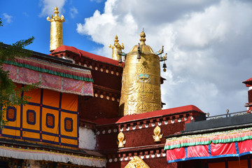 Fototapeta na wymiar Tibet, Lhasa, the first Buddhist temple of Jokhang. Gold attributes of Buddhism