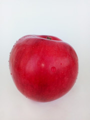 red apple isolated on white background, water drops on ripe apple