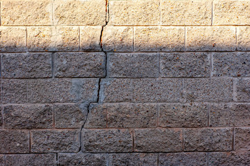 Texture of urban old bricks walls, stone structure closeup background