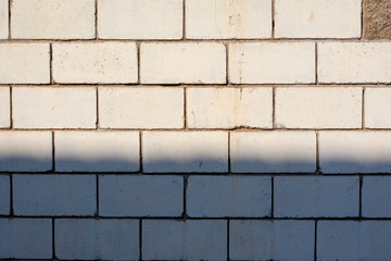 Texture of urban old bricks walls, stone structure closeup background