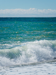 Seascape with waves and clear sky.