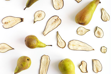 Pear fruit chips, dried fruit, slices. Fruit pattern. Top view, flat layout.
