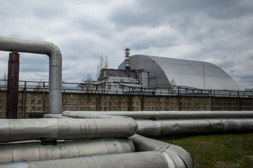  View of the destroyed Reactor 4 and the Memorial for the Chernobyl liquidators, Chernobyl...