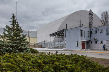  View of the destroyed Reactor 4 and the Memorial for the Chernobyl liquidators, Chernobyl...