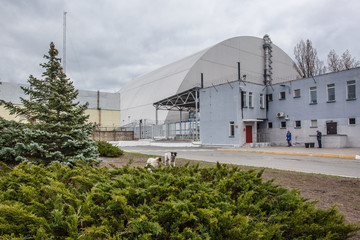  View of the destroyed Reactor 4 and the Memorial for the Chernobyl liquidators, Chernobyl...