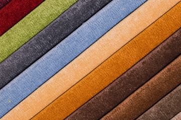 Fototapeta premium Abstract diagonal textile background multicolored stripes from factory upholstery textiles for furniture