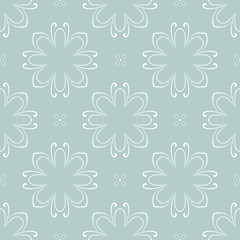Floral vector ornament. Seamless abstract classic background with flowers. Pattern with white repeating floral elements. Ornament for fabric, wallpaper and packaging