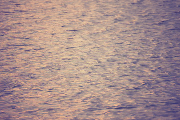 beautiful water wave pattern sunset with nice harmonic structure and reflections