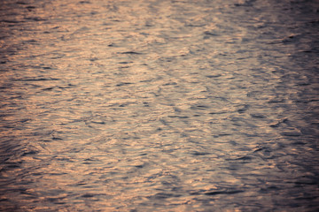 beautiful water wave pattern sunset with nice harmonic structure and reflections