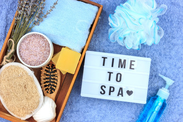 Natural herbal spa cosmetics with lavender extract - soap, salt, towel, massage brush, washcloth