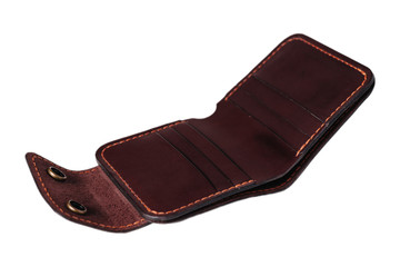 Leather accessories on a white background, wallets, coin boxes and straps, isolated