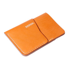 Leather accessories on a white background, wallets, coin boxes and straps, isolated