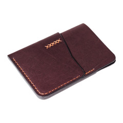 Leather accessories on a white background, wallets, coin boxes and straps, isolated