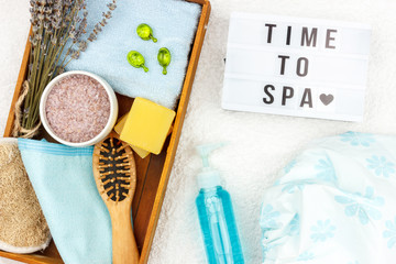 Natural herbal spa cosmetics with lavender extract - soap, salt, towel, massage brush, washcloth