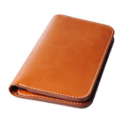 Leather accessories on a white background, wallets, coin boxes and straps, isolated