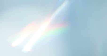 Diamond Creates a Bright Highlight. Loop. The light passes through the facets of a slowly rotating diamond and creates repetitive sparkling highlights and rainbow colors - Powered by Adobe