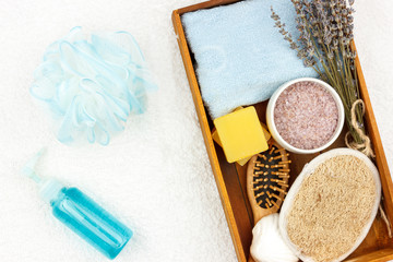 Naklejka premium Natural herbal spa cosmetics with lavender extract - soap, salt, towel, massage brush, washcloth