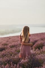 Fototapeta na wymiar Woman in the lavender field