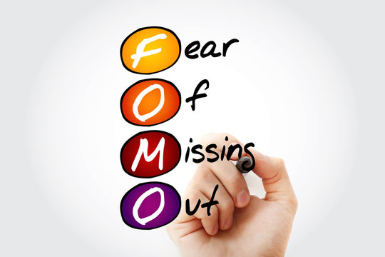 FOMO - Fear Of Missing Out, acronym with marker, concept background