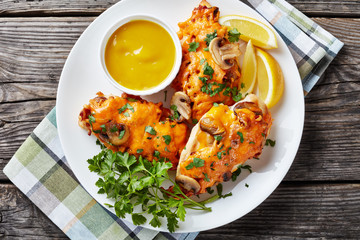 chicken breasts topped with bacon, cheese, closeup
